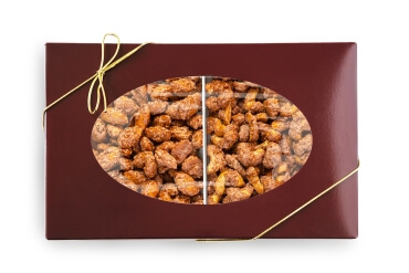 Burgundy Box shown with cinnamon glazed cashews on the left, and cinnamon glazed pecans on the right, photo taken on a black background